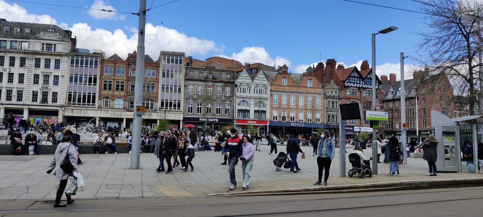 Photo of old market square in Nottingham full of people