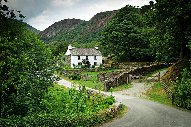 Cottage or farmhouse in a typical Lake District setting.